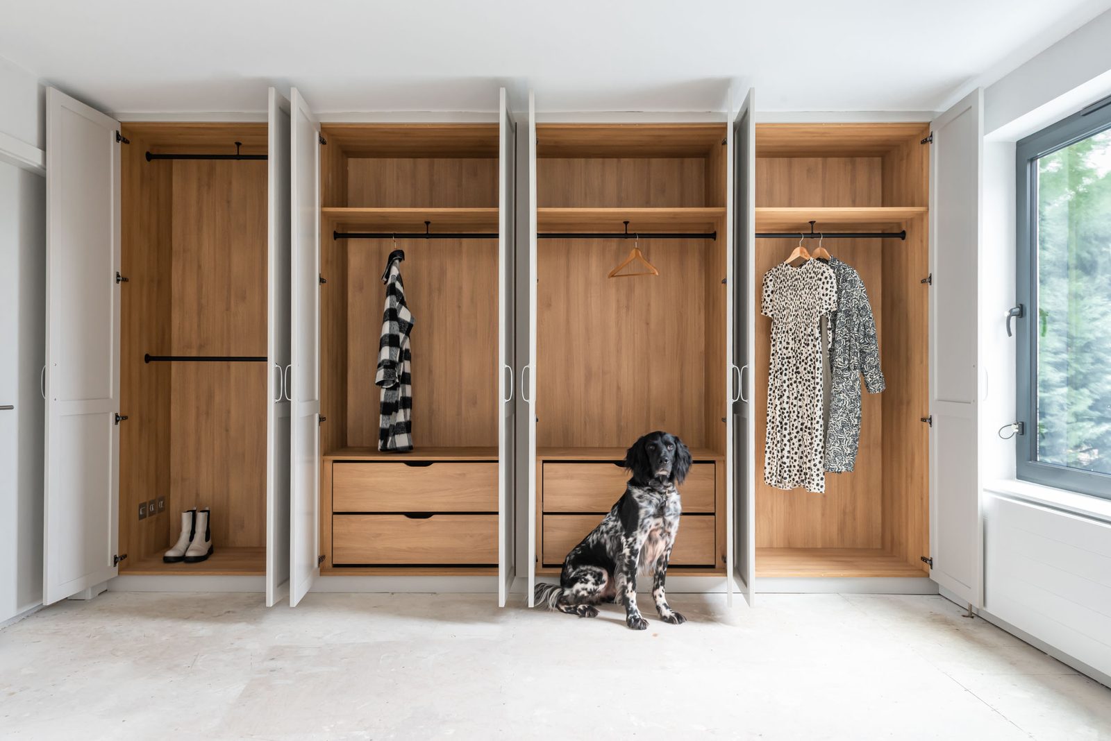 Bespoke fitted wardrobe with oak interior